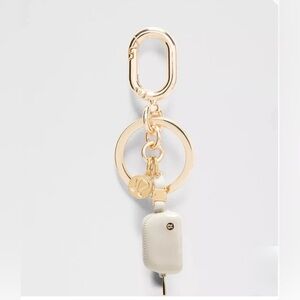 NWT Lululemon Everywhere Belt Bag Charm Keychain Cream and Gold
